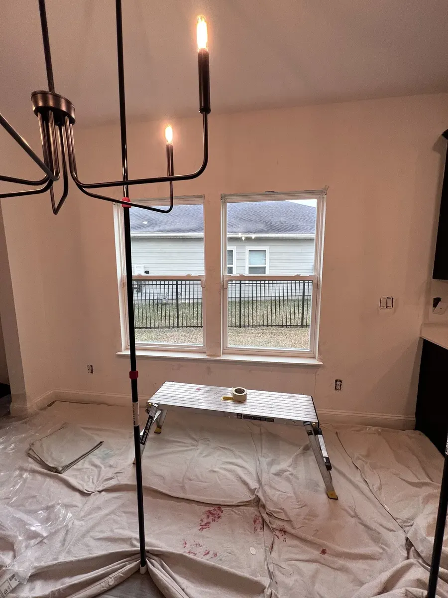 Dining area protected while the marble feature wall was installed